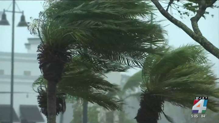 Storm surge, 911 overload, and missed rescues: Leaders say don’t risk it