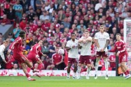 Szoboszlai stunner secures Liverpool win over Arsenal as Man City collapses to another loss