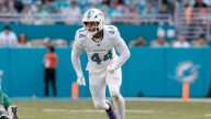 Dolphins' Chop Robinson carted off practice field with injury
