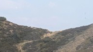Rescatada una voluntaria en los incendios al desmayarse en el monte Catoute