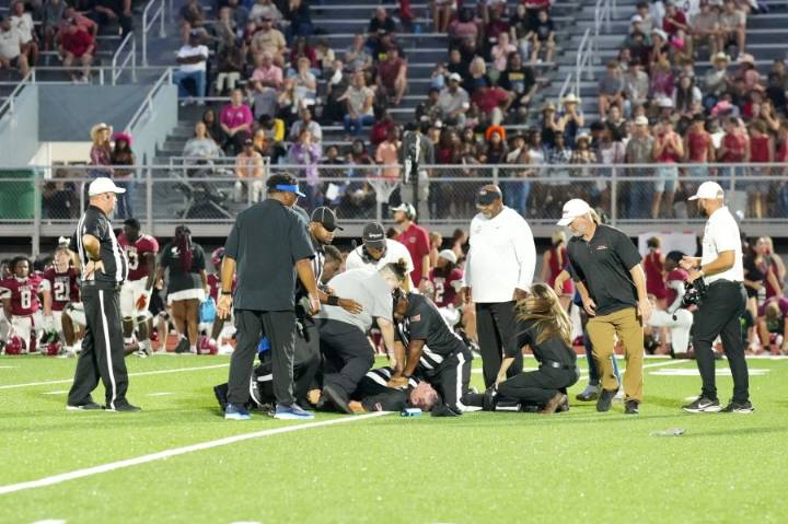High school football referee hailed as a hero after administering CPR to colleague who collapsed on field in Sylacauga