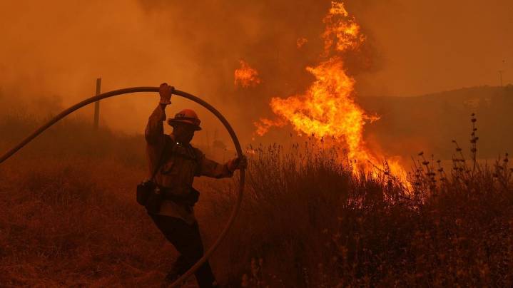 Firefighters make progress against blaze that forced thousands to flee north of Los Angeles