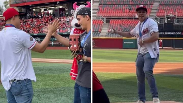 Osmar Olvera, campeón del mundo en clavados, lanza la primera bola al abrir los playoffs de los Diablos Rojos del México; su ‘socio’ Juan...