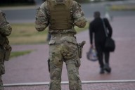 Some Guard units in Washington are now carrying firearms, Pentagon says. Trump targets more cities