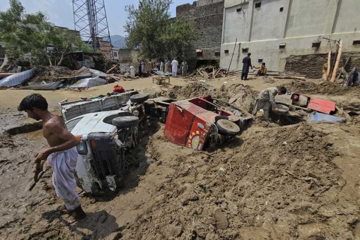 Pakistan expands rescue and relief efforts after floods kill over 200 in a single district