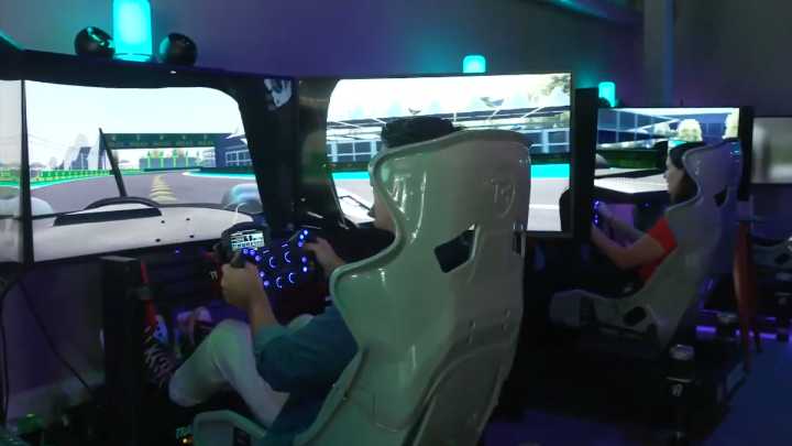 Race to the finish line in a full-motion immersive simulator at Shift Arcade in Wynwood