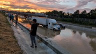 Tennessee interstate shuts down after floodwaters nearly submerge cars