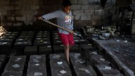 Migrants returning to Venezuela face debt and harsh living conditions