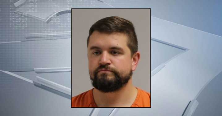 Bond set for Portage police officer who is charged with child abuse and domestic abuse
