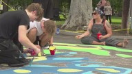 Spokane artists painting 'asphalt art' on neighborhood streets