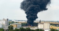 Intense fire in Ogden rail yard sends clouds of black smoke into the air