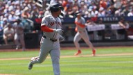 Devers homers early and Giants blank Nationals 5