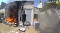NYPD officers help Coney Island residents, dog escape house fire