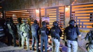 Catean casa en García, NlL; aseguran armas y drogas