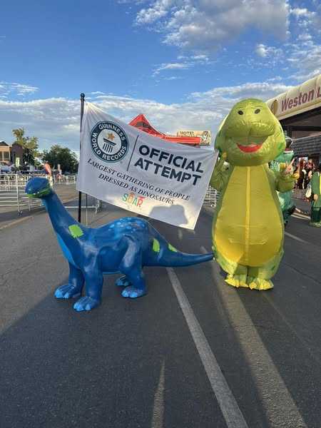 Dinosaurs Pack Main Street At Dinah SOAR Days For World Record Attempt
