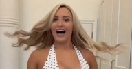 Emma Louise Jones suffers wardrobe malfunction in wind at York races