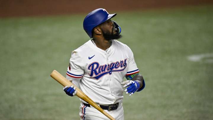 Rangers put struggling slugger Adolis Garcia on IL and activate Evan Carter