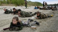 Chilling moment Russian kids crawl with AK-47s & throw grenades as Vladimir Putin prepares his next generation army