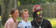 Cowboys’ Overshown hosts third annual ‘Back to School’ event at Arp City Park