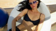 Nicola Peltz Beckham has a mermaid moment in sleek black swimwear