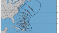 Hurricane Erin, downgraded to Category 3, will pass offshore