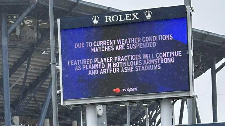 US Open suspended as courts left completely flooded as HURRICANE hurtles towards New York