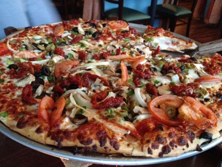 Try the deep-dish pizza at The Handsome Hobo in Muskegon