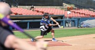 Firefighters defeat police in annual charity softball match