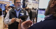 Asian shares are mixed in quiet trading as traders await cues from the Fed
