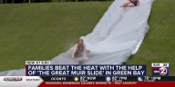 Families beat the heat with the return of the Great Muir Slide to Green Bay