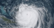 Hurricane Erin churns up dangerous waves and closes beaches along US East Coast