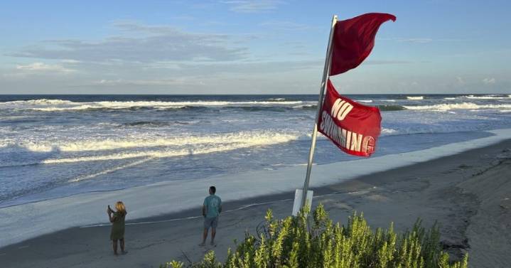 What is a rip current and how do you escape from one?
