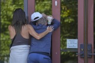 Investigators look for a motive in a deadly mass shooting at Minneapolis church
