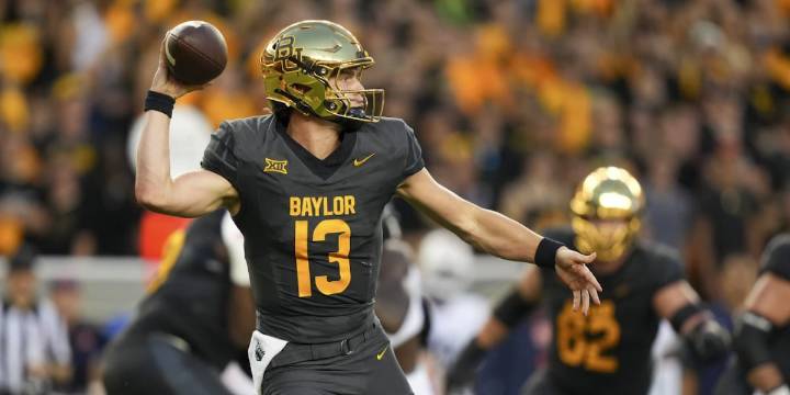 QB Jackson Arnold runs for 137 yards and 2 TDs in Auburn debut for a 38
