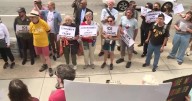 Demonstrators rally against ICE deportation raids at Richmond City Hall