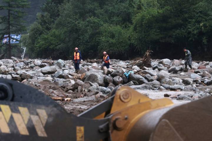Flash floods kill at least 10 people and leave 33 missing in northwestern China