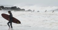 Erin weakens to post-tropical cyclone, moving out to sea as it batters East Coast with wind, waves