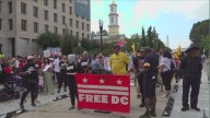Hundreds protest Trump's takeover of DC Police Department