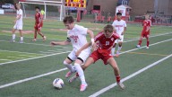 Local Sports: New Bedford coach debuts with victory over Monroe