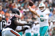 Zach Wilson's Dolphins debut had one head