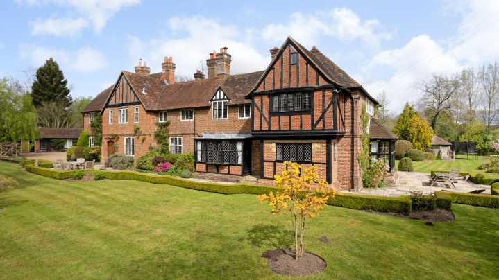 A 17th century farmhouse in Surrey with one of Britain's oldest squash courts
