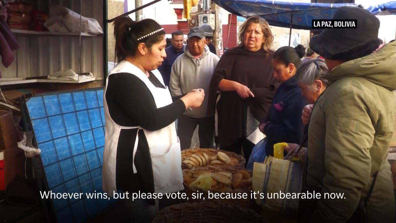 Shrunken piece of bread explains Bolivia’s economic woes ahead of elections