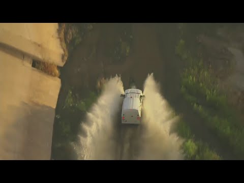 LA police chase suspect drives into waterway tunnel