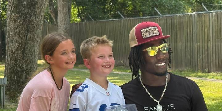 Cowboys’ Overshown hosts third annual ‘Back to School’ event at Arp City Park