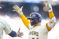 Brewers beat the Pirates 12-5 to extend their winning streak to 12 games