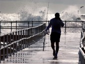 Hurricane Erin picks up steam as it edges along the East Coast