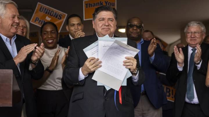 Pritzker signs union protection bills amid Trump war on federal unions