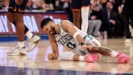 Jayson Tatum takes in Patriots camp without walking boot