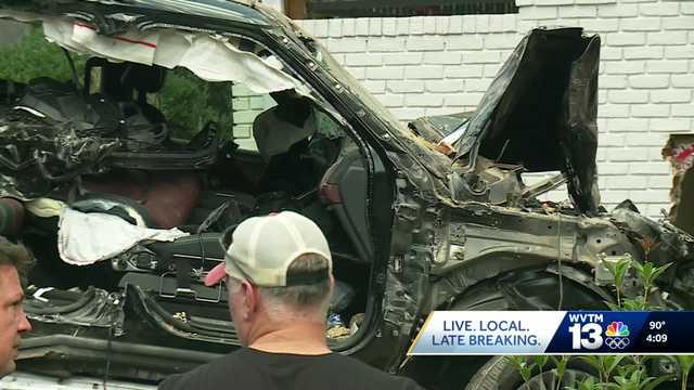 Woman rescued after SUV crashes into Birmingham home, causes gas leak