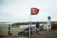 Beach closings and warnings from Hurricane Erin put damper on summer's end for East Coast